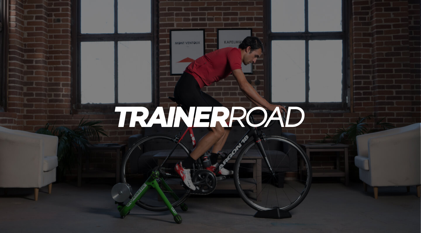 TrainerRoad Wordmark Overlaying Cyclist